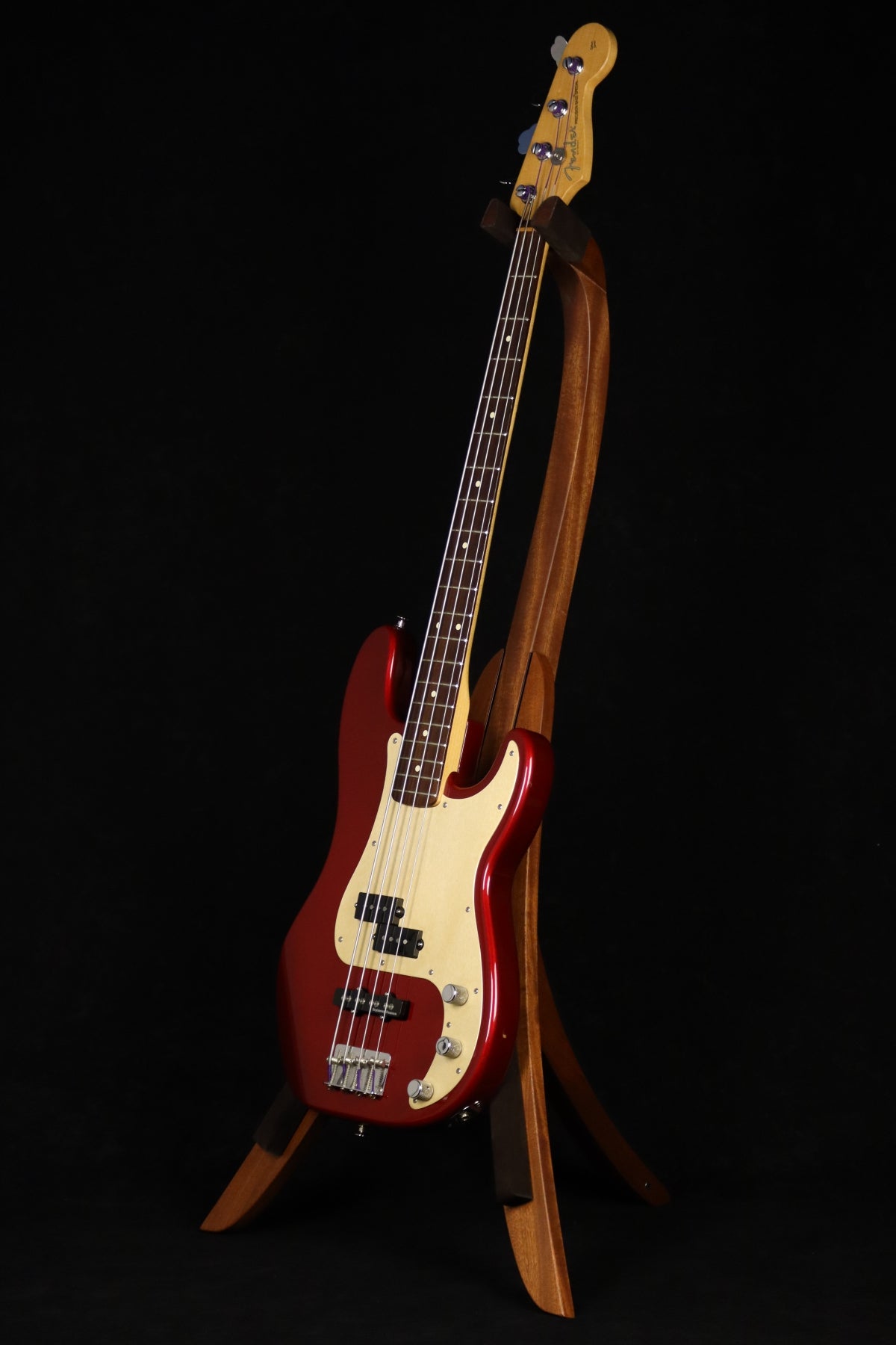 Folding sapele mahogany wood electric bass guitar floor stand full front image with Fender Jazz 4 string bass