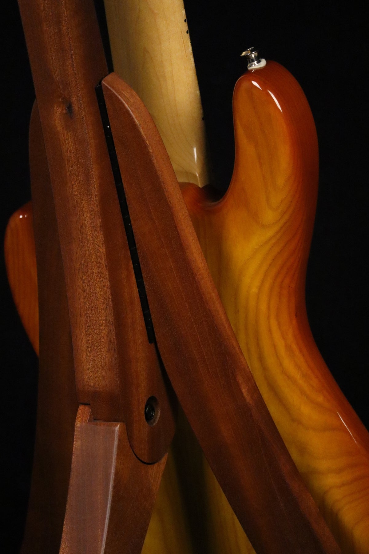 Folding sapele mahogany wood electric bass guitar floor stand closeup rear image