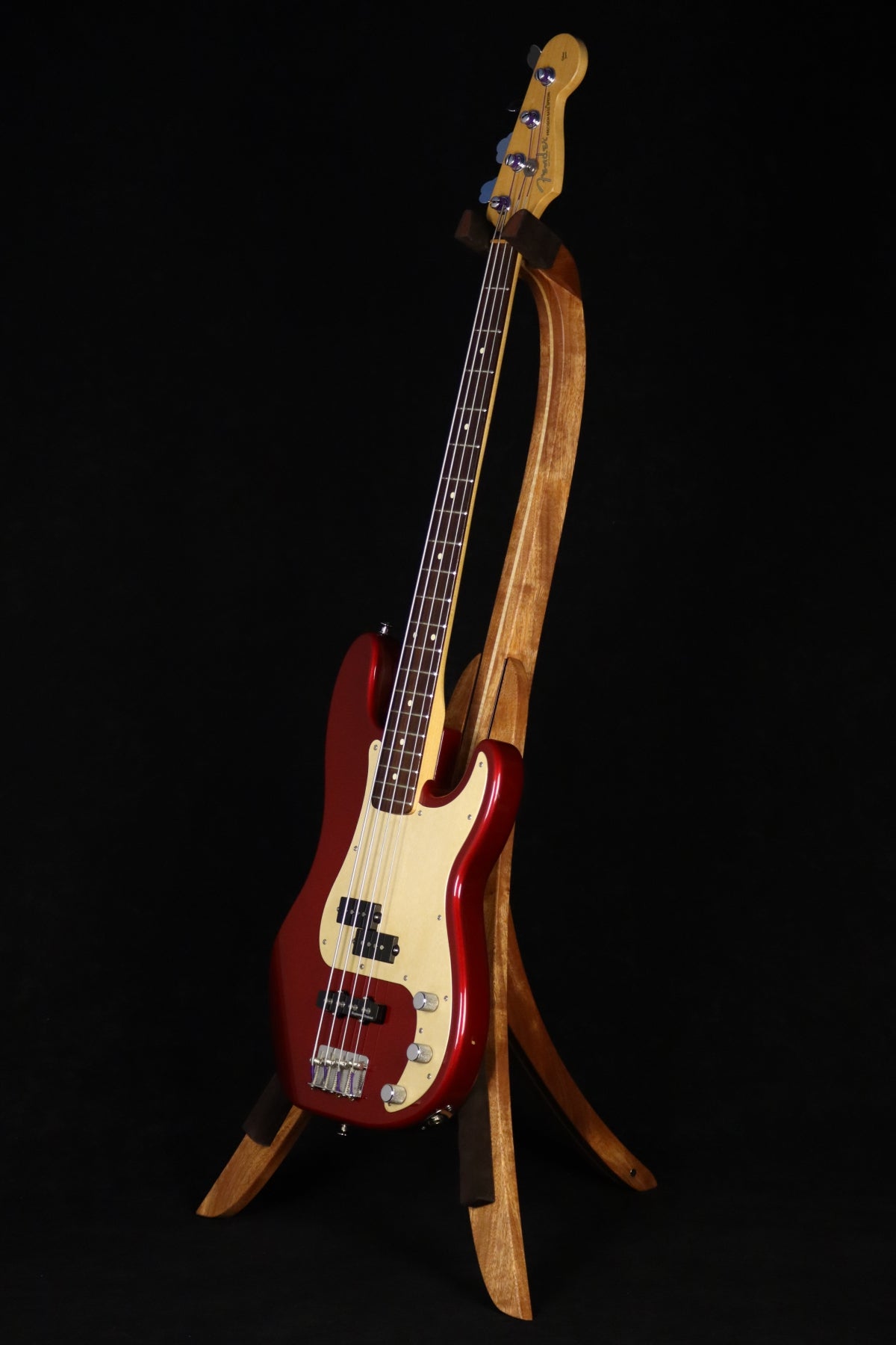 Folding sapele mahogany and curly maple wood electric bass guitar floor stand full front image with Fender Jazz 4 string bass