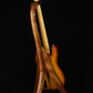 Folding sapele mahogany and curly maple wood electric bass guitar floor stand full rear image with Sadowsky 5 string bass