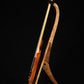 Folding sapele mahogany and curly maple wood electric bass guitar floor stand full side image with Sadowsky 5 string bass