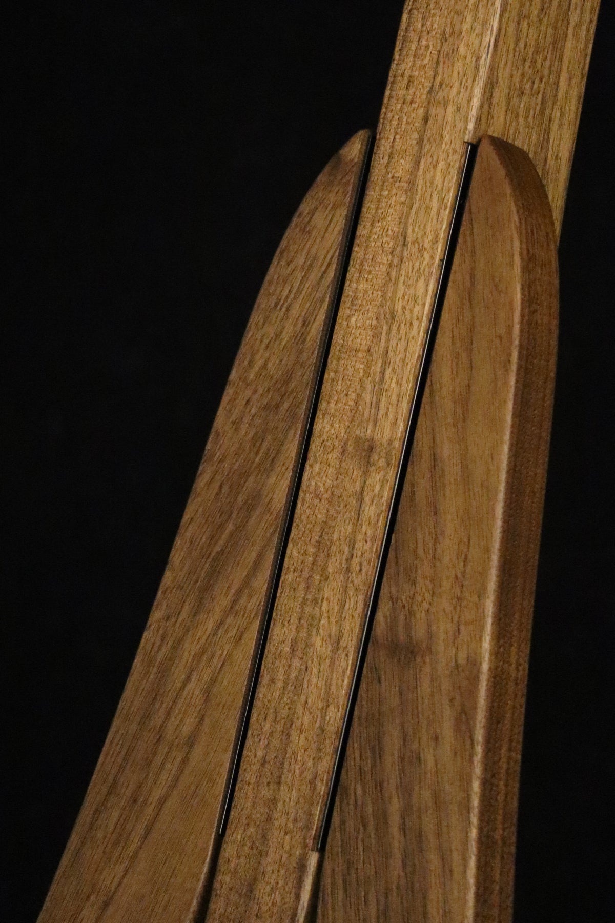 Folding walnut wood electric bass guitar floor stand closeup front image
