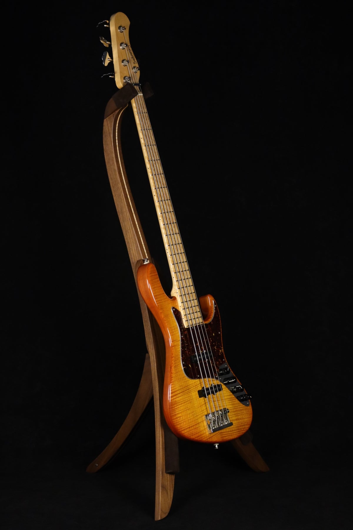 Folding walnut and curly maple wood electric bass guitar floor stand full front image with Sadowsky 5 string bass