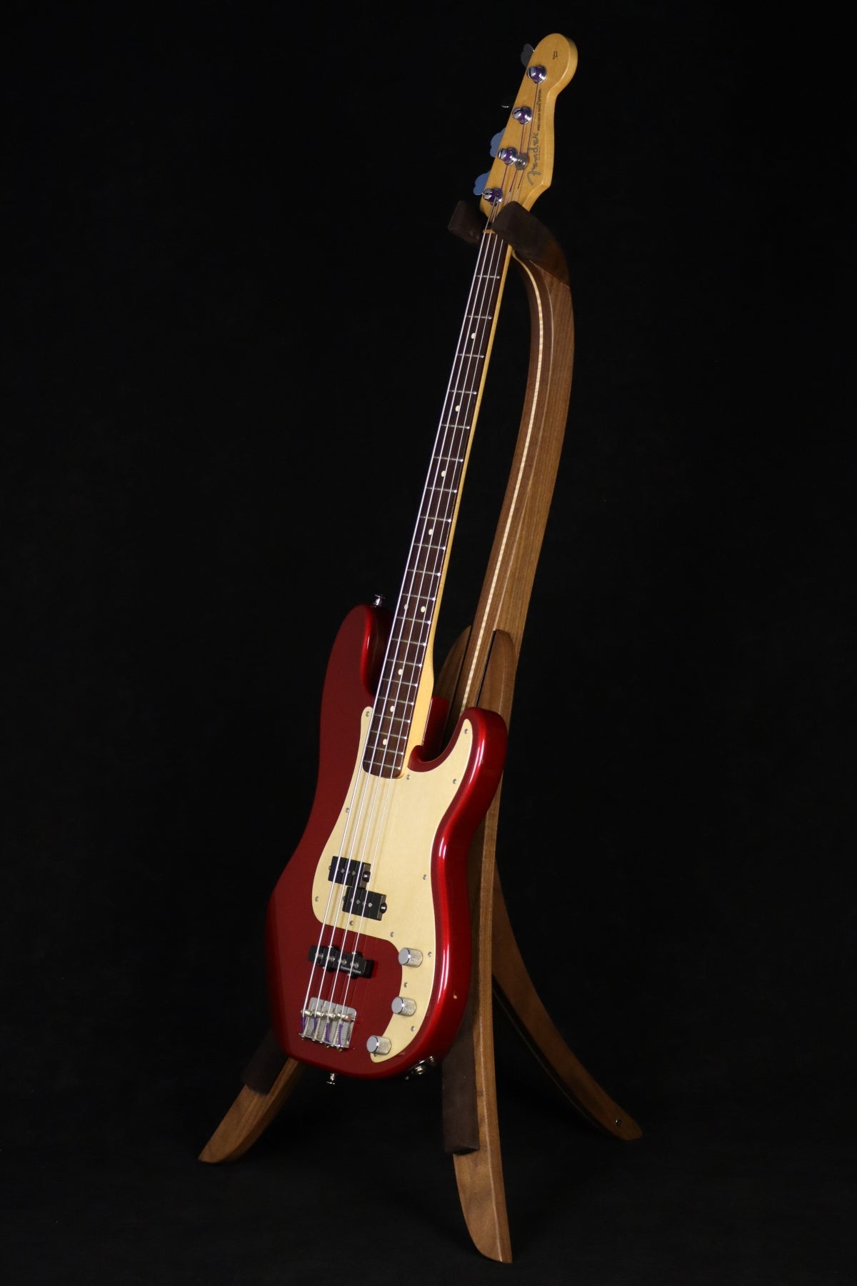 Folding walnut and curly maple wood electric bass guitar floor stand full front image with Fender Jazz 4 string bass