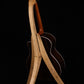 Folding curly maple wood guitar floor stand full rear image with Taylor guitars