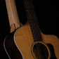 Folding curly maple wood guitar floor stand closeup front image with Taylor guitar
