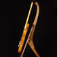 Folding chechen Caribbean rosewood and curly maple wood guitar floor stand full side image with Fender guitar
