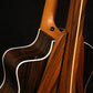 Folding morado Bolivian rosewood pau fero and curly maple wood guitar floor stand closeup rear image with Taylor guitar