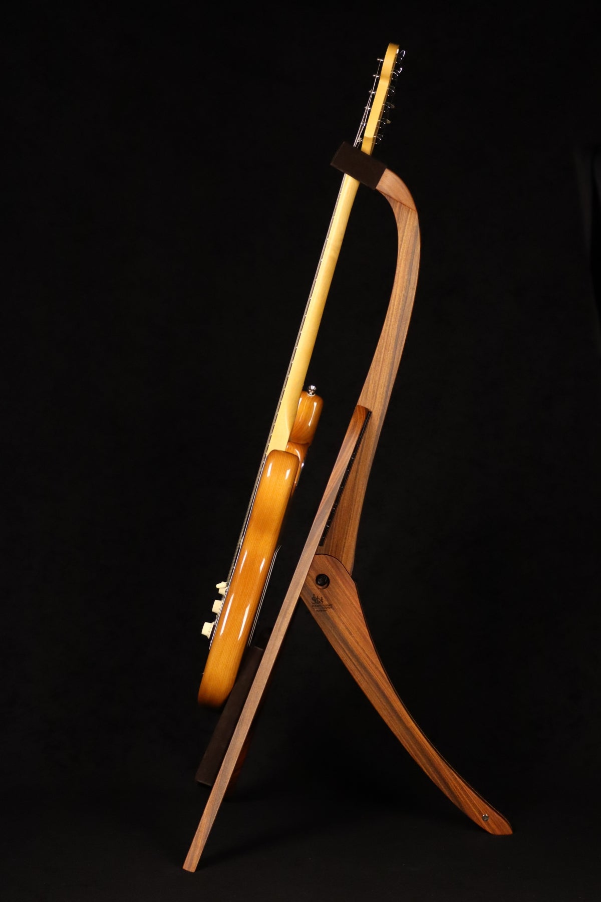 Folding morado Bolivian rosewood pau fero and curly maple wood guitar floor stand full side image with Fender guitar