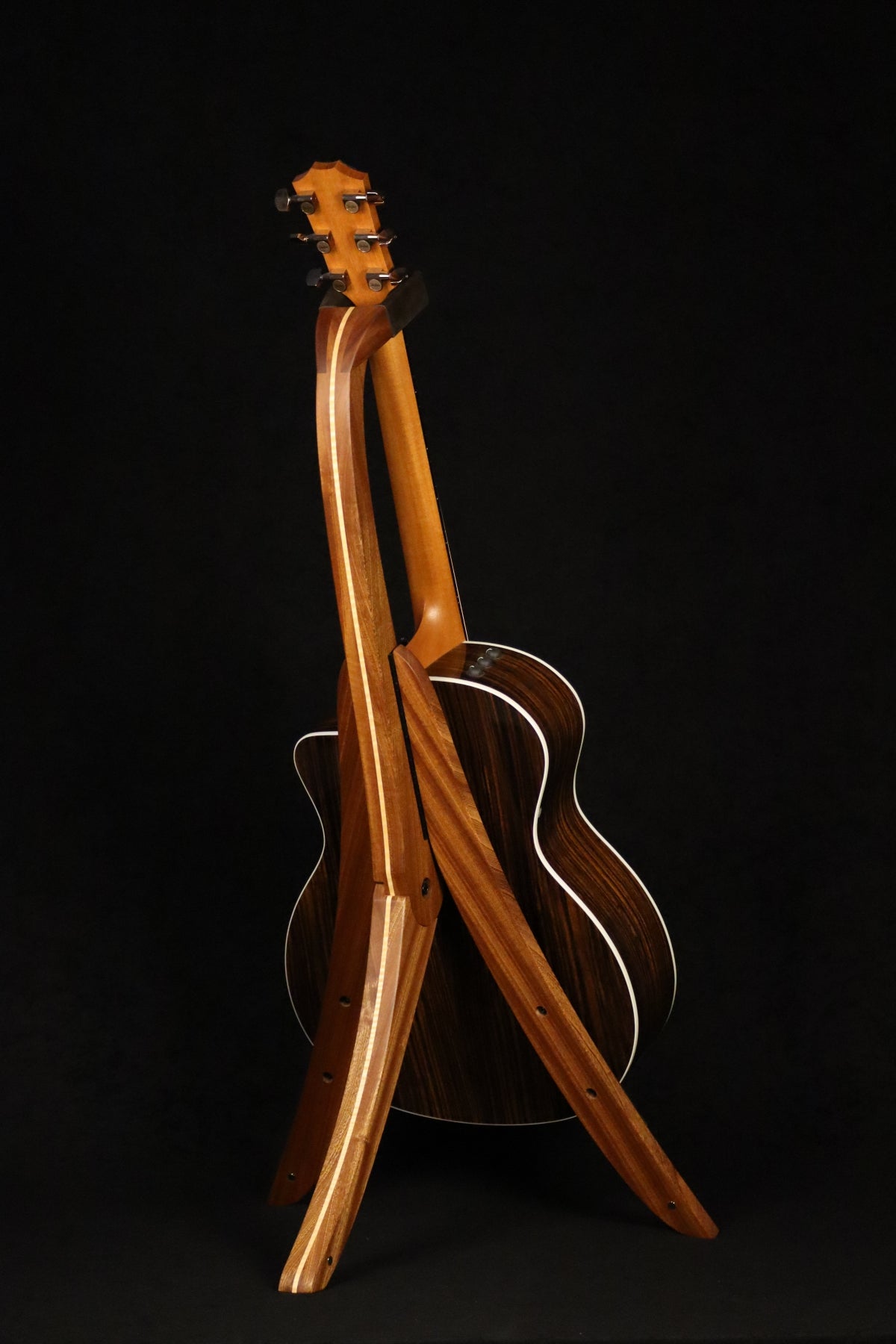 Folding sapele mahogany and curly maple wood guitar floor stand full rear image with Taylor guitar
