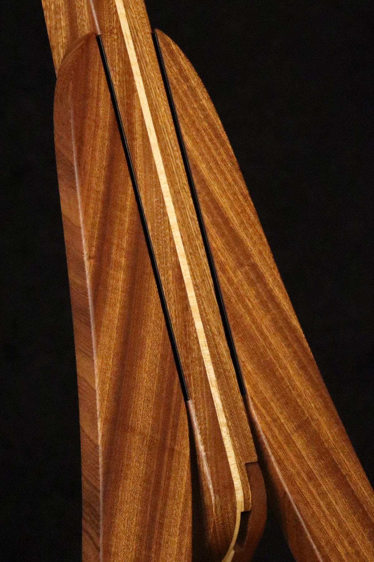 Folding sapele mahogany and curly maple wood guitar floor stand closeup front image