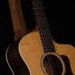 Folding walnut wood guitar floor stand closeup front image with Taylor guitar