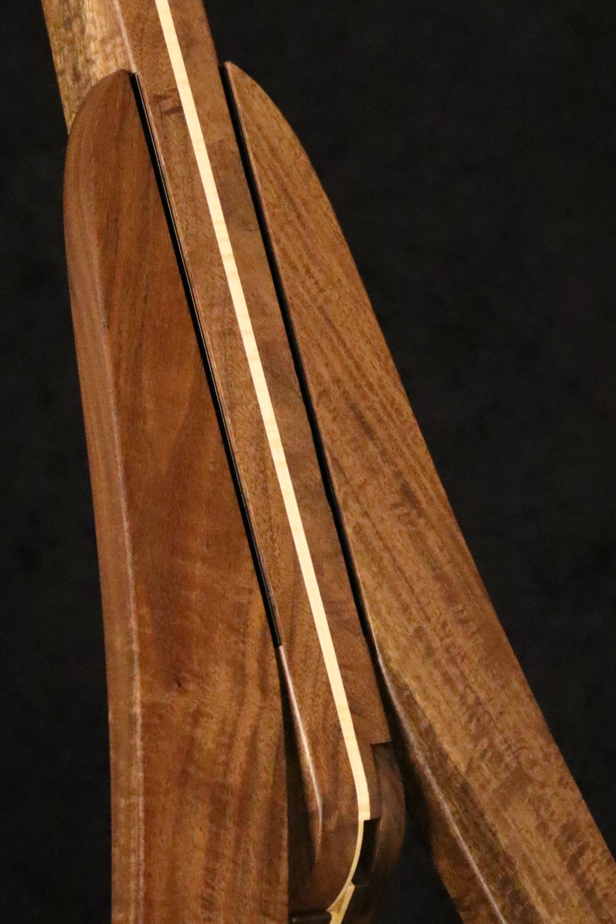 Folding walnut and curly maple wood guitar floor stand closeup front image