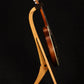 Folding cherry wood mandolin floor stand full side image with Eastman mandolin