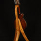 Folding cherry and walnut wood mandolin floor stand full rear image with Eastman mandolin