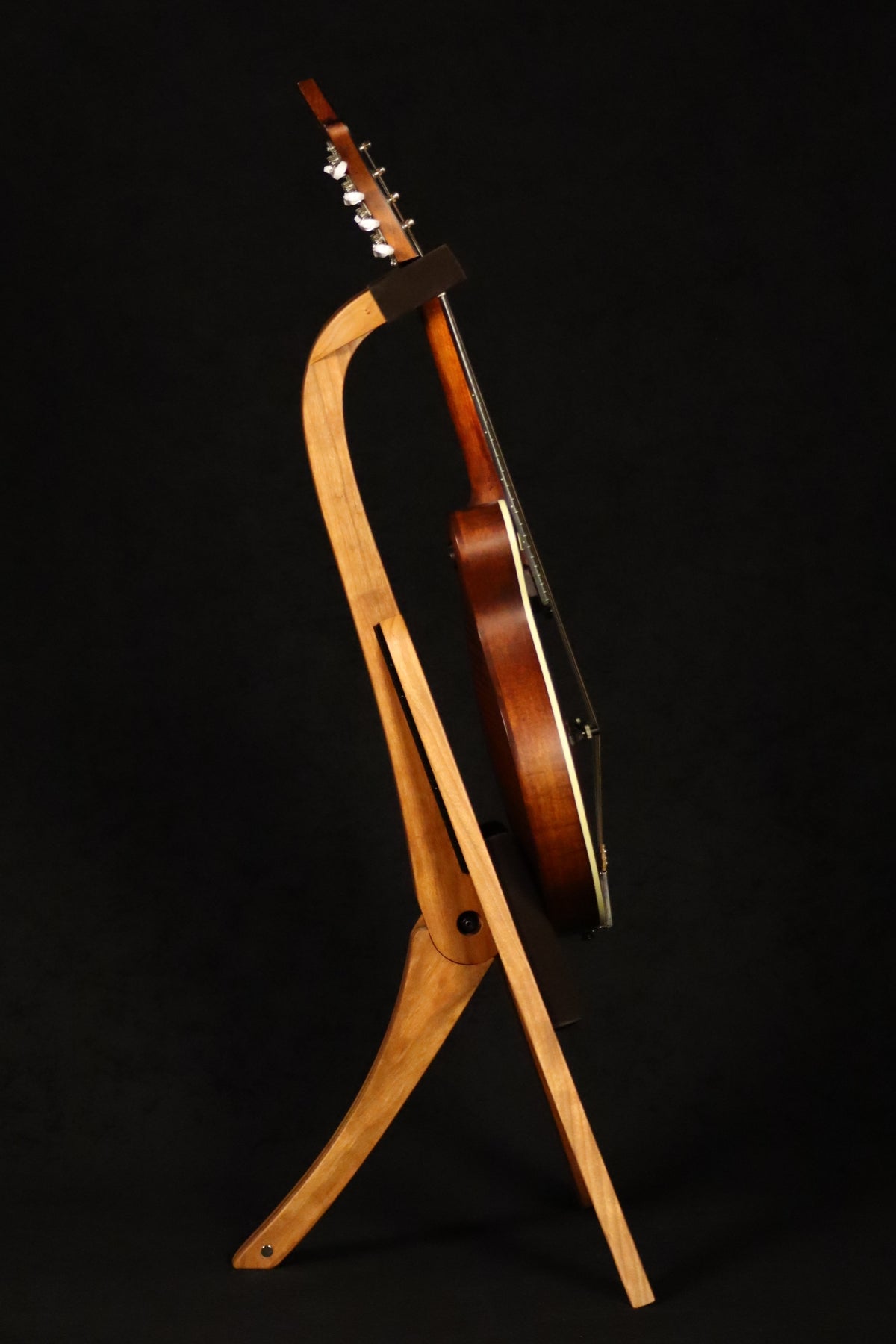 Folding cherry and walnut wood mandolin floor stand full side image with Eastman mandolin
