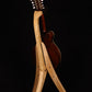 Folding curly maple wood mandolin floor stand full rear image with Eastman mandolin
