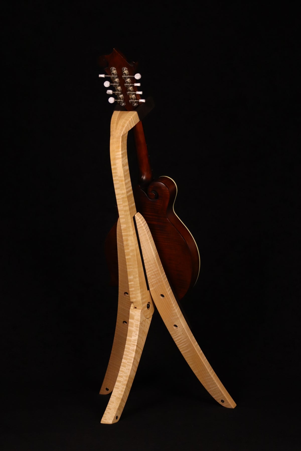 Folding curly maple wood mandolin floor stand full rear image with Eastman mandolin