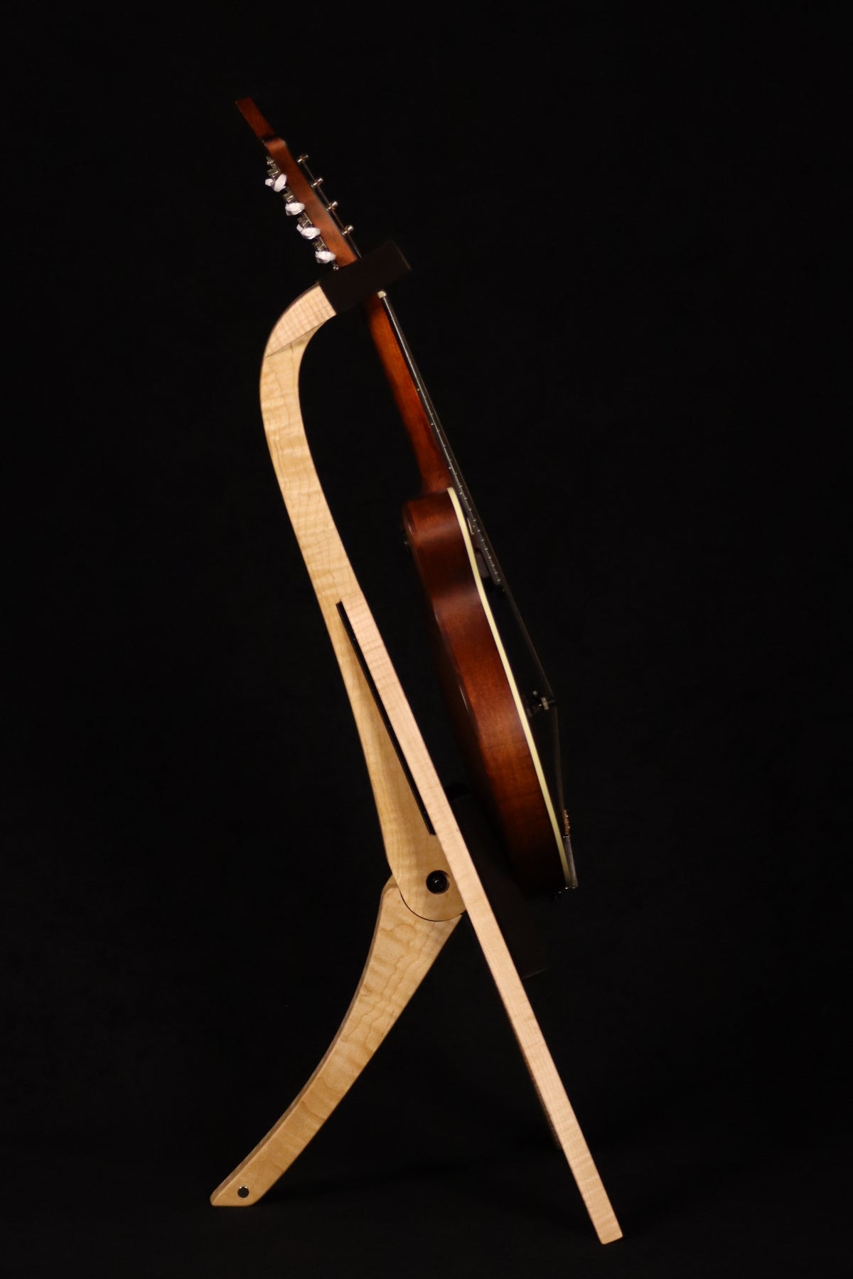 Folding curly maple wood mandolin floor stand full side image with Eastman mandolin