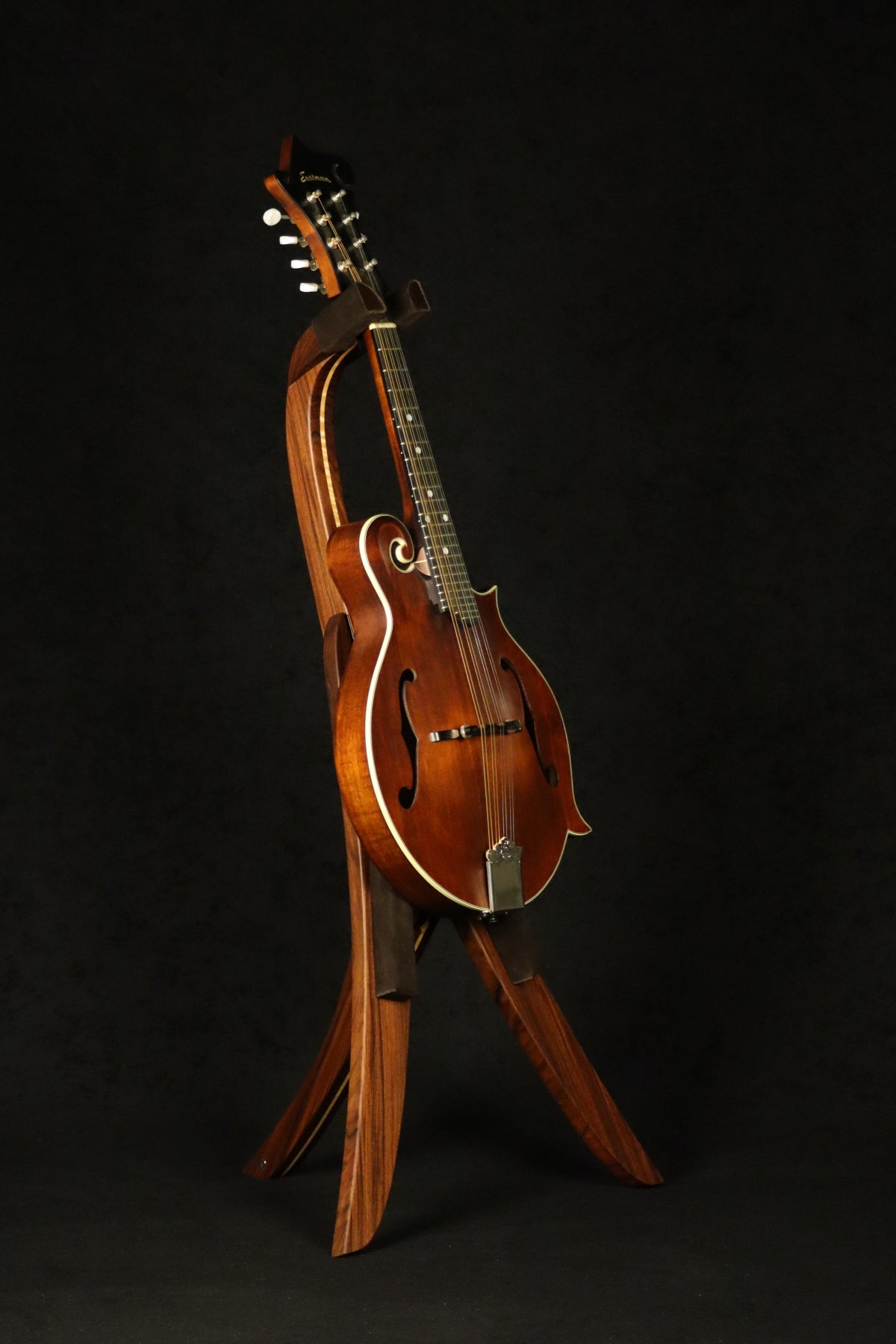 Folding morado Bolivian rosewood pau fero and curly maple wood mandolin floor stand full front image with Eastman mandolin