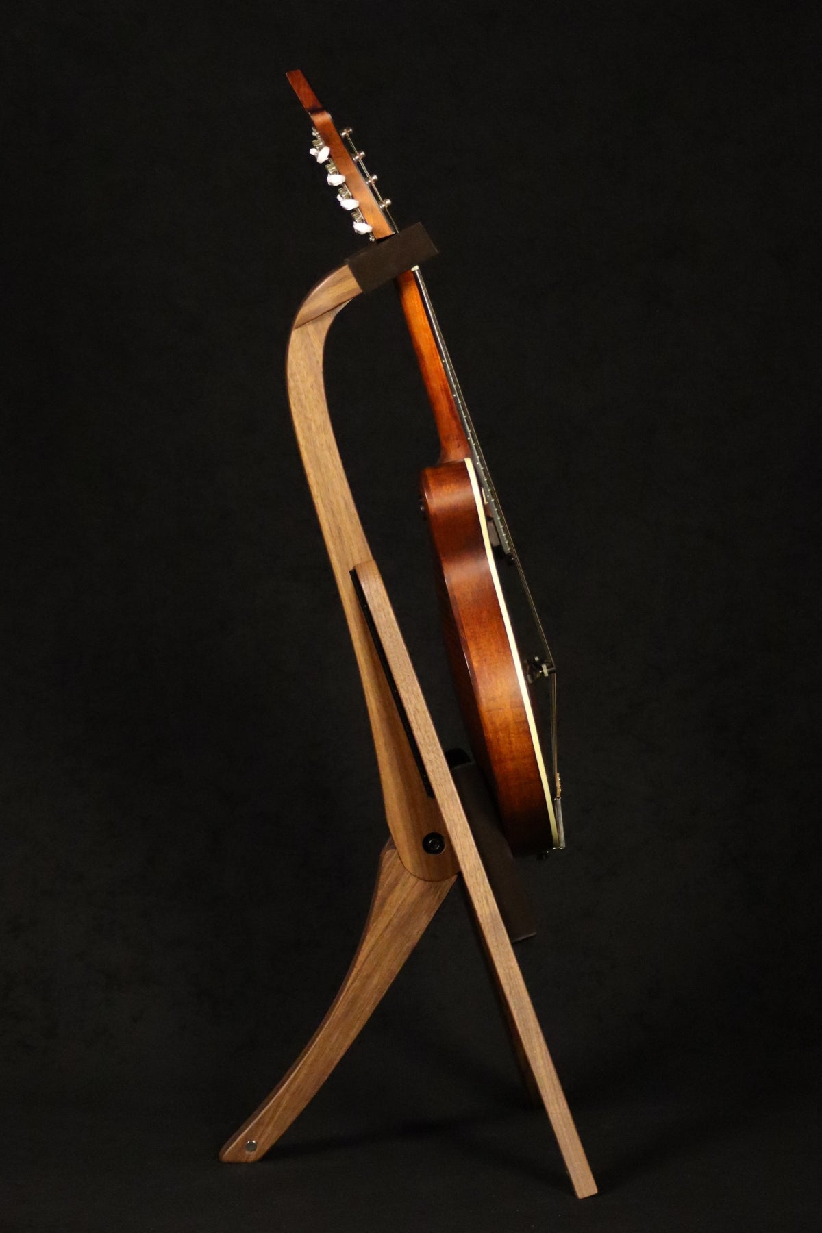 Folding walnut wood mandolin floor stand full side image with Eastman mandolin