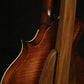 Folding walnut wood mandolin floor stand closeup rear image with Eastman mandolin
