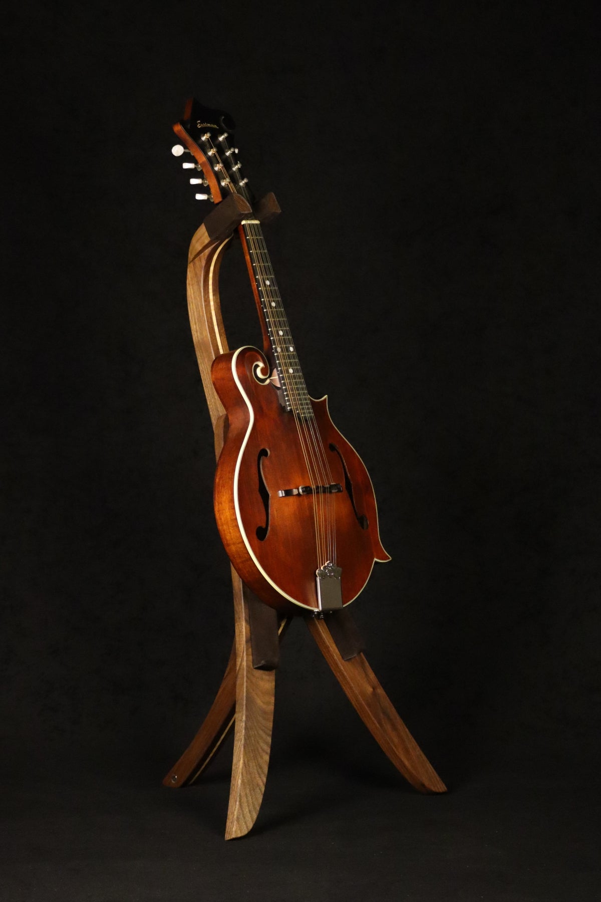 Folding walnut and curly maple wood mandolin floor stand full front image with Eastman mandolin