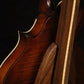 Folding walnut and curly maple wood mandolin floor stand closeup rear image with Eastman mandolin
