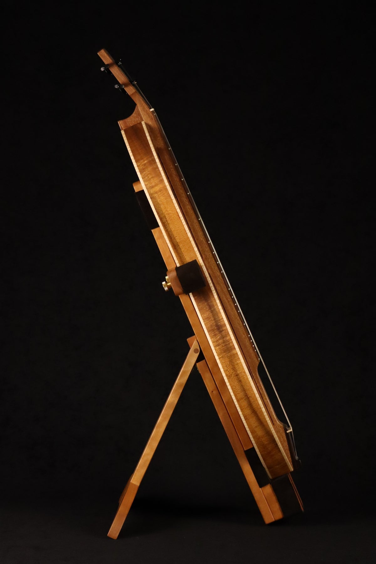 Folding cherry wood mountain dulcimer floor stand full side image with Tindle koa dulcimer