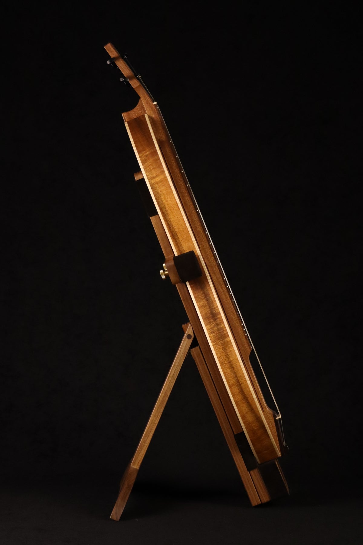 Folding walnut wood mountain dulcimer floor stand full side image with Tindle koa dulcimer