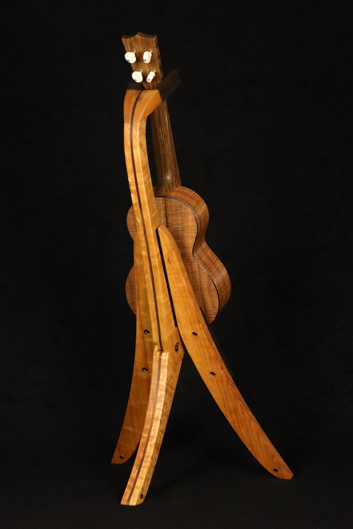 Folding cherry and walnut wood ukulele floor stand full rear image with Martin ukulele