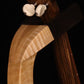 Folding curly maple wood ukulele floor stand yoke detail image with Martin ukulele