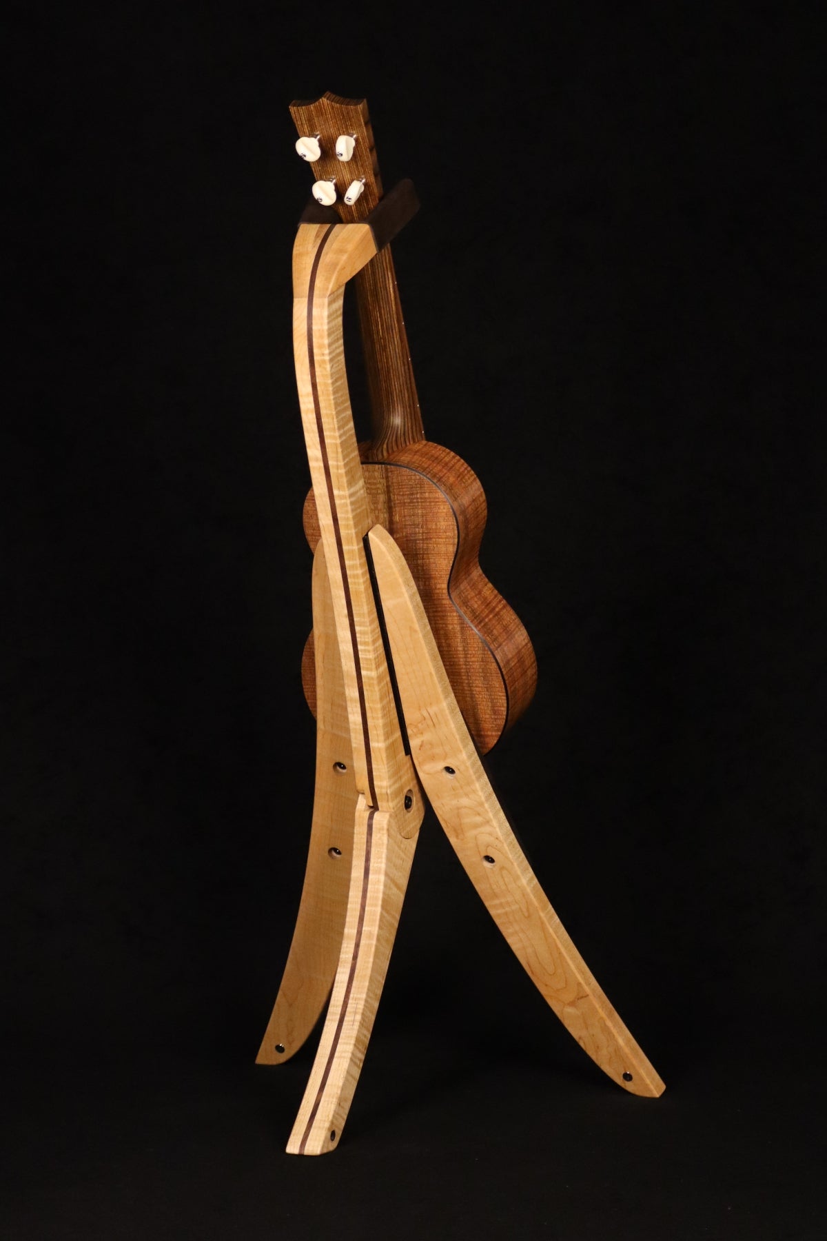 Folding curly maple and walnut wood ukulele floor stand full rear image with Martin ukulele