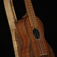 Folding curly maple and walnut wood ukulele floor stand closeup front image with Martin ukulele