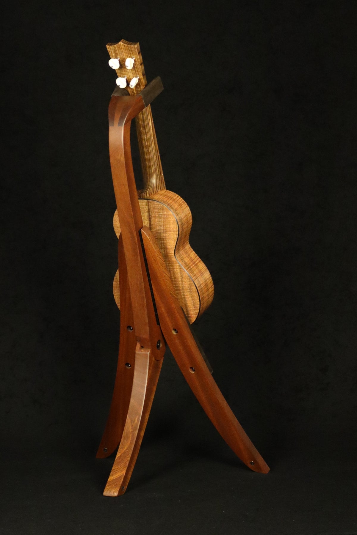 Folding sapele mahogany wood ukulele floor stand full rear image with Martin ukulele