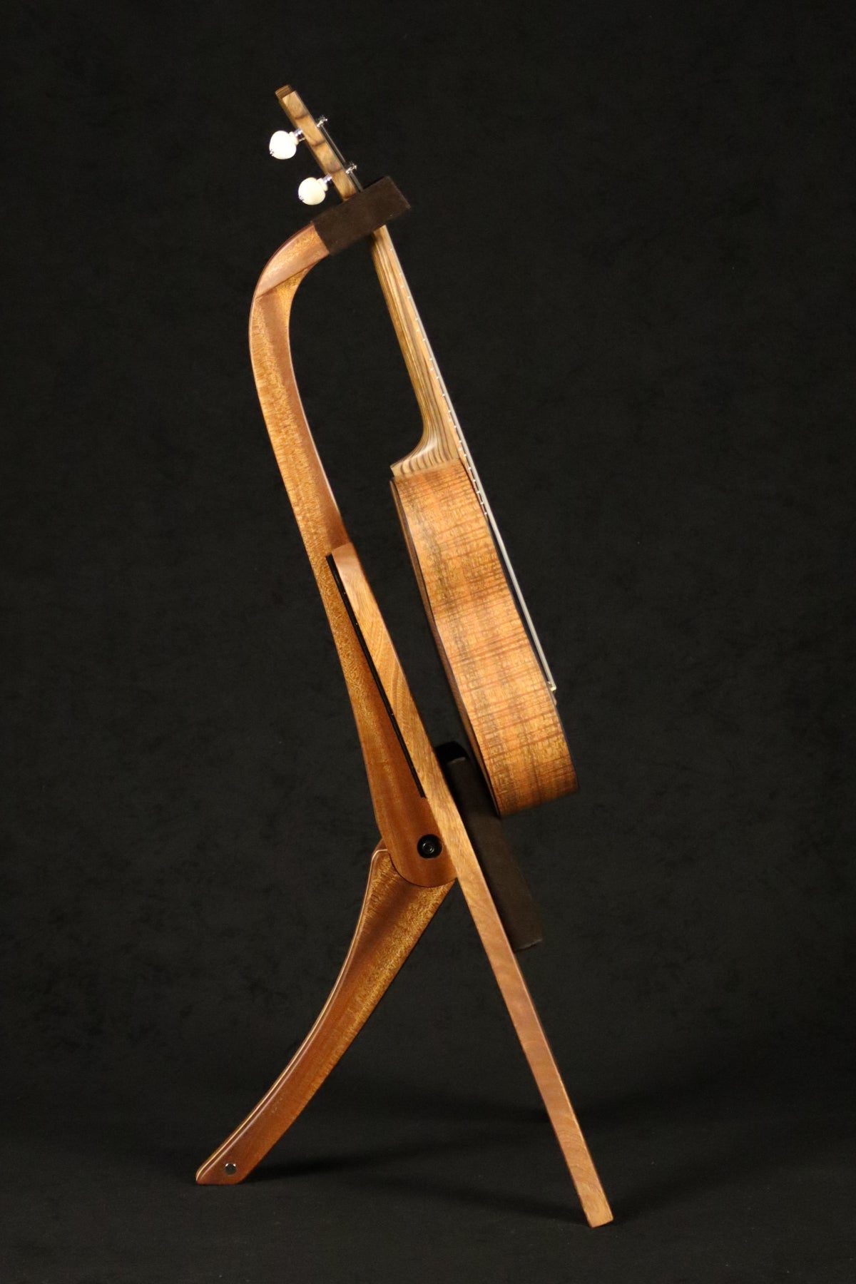 Folding sapele mahogany and curly maple wood ukulele floor stand full side image with Martin ukulele