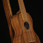 Folding sapele mahogany and curly maple wood ukulele floor stand closeup front image with Martin ukulele