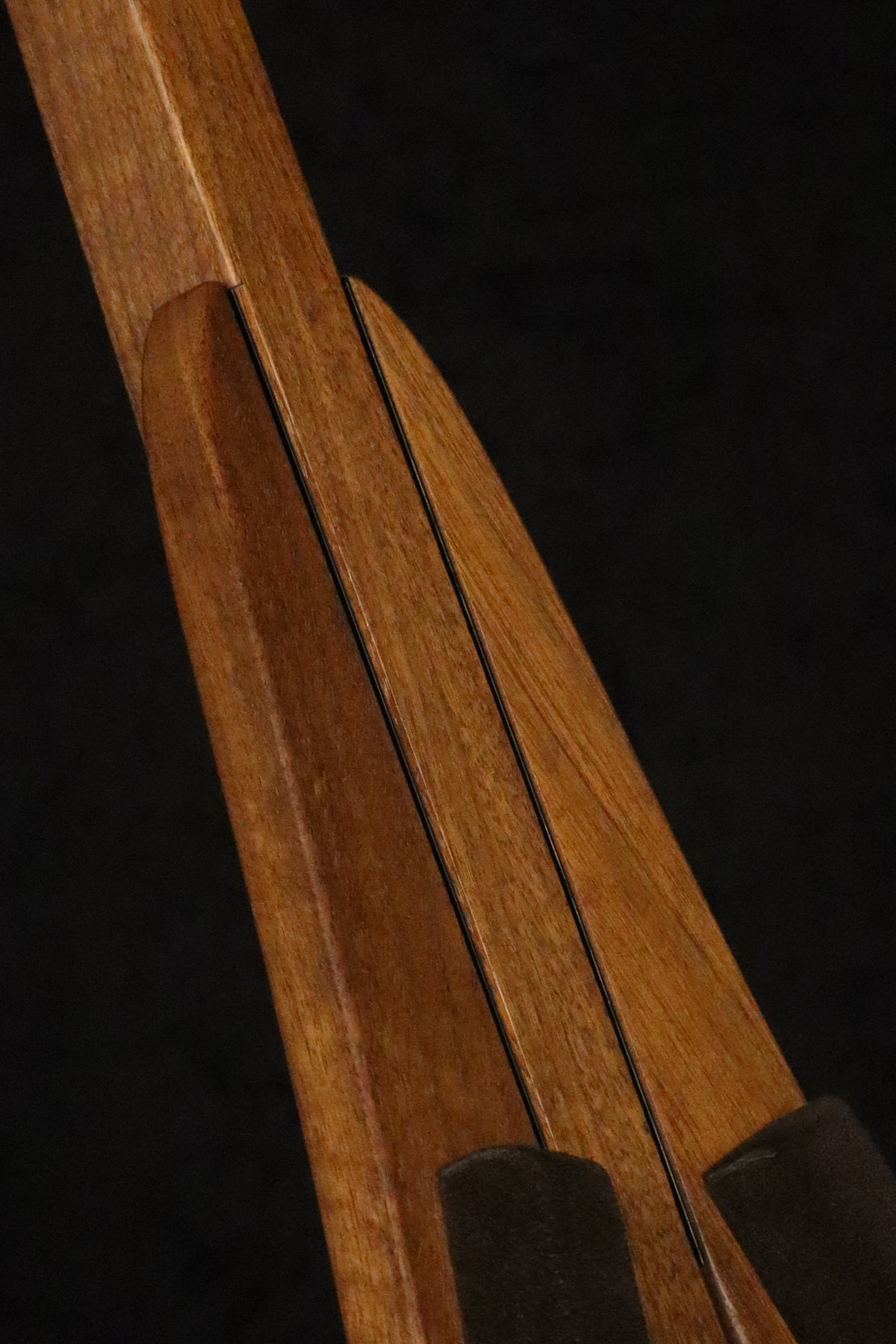 Folding walnut wood ukulele floor stand closeup front image