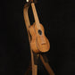 Folding walnut and curly maple wood ukulele floor stand full front image with Martin ukulele