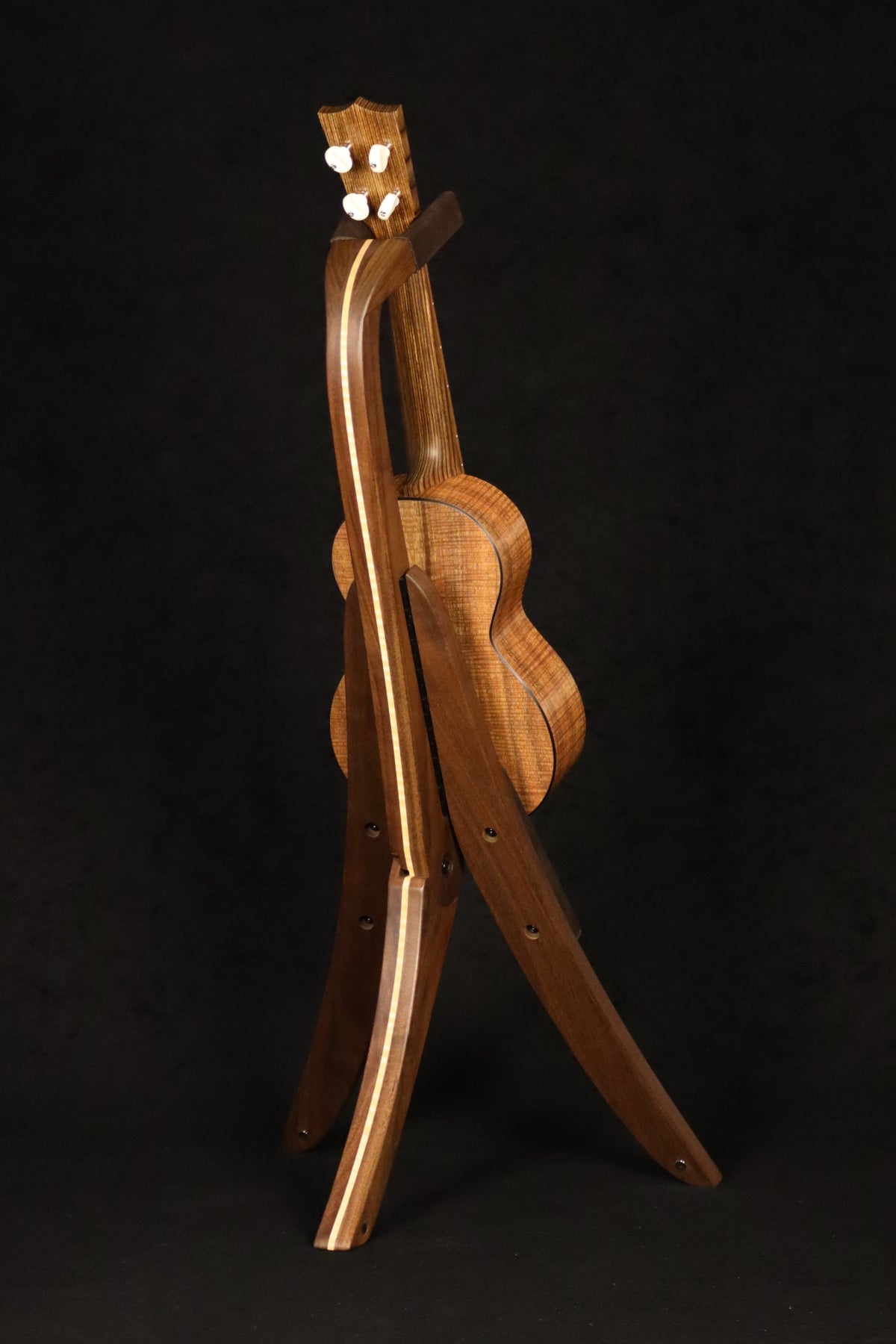 Folding walnut and curly maple wood ukulele floor stand full rear image with Martin ukulele