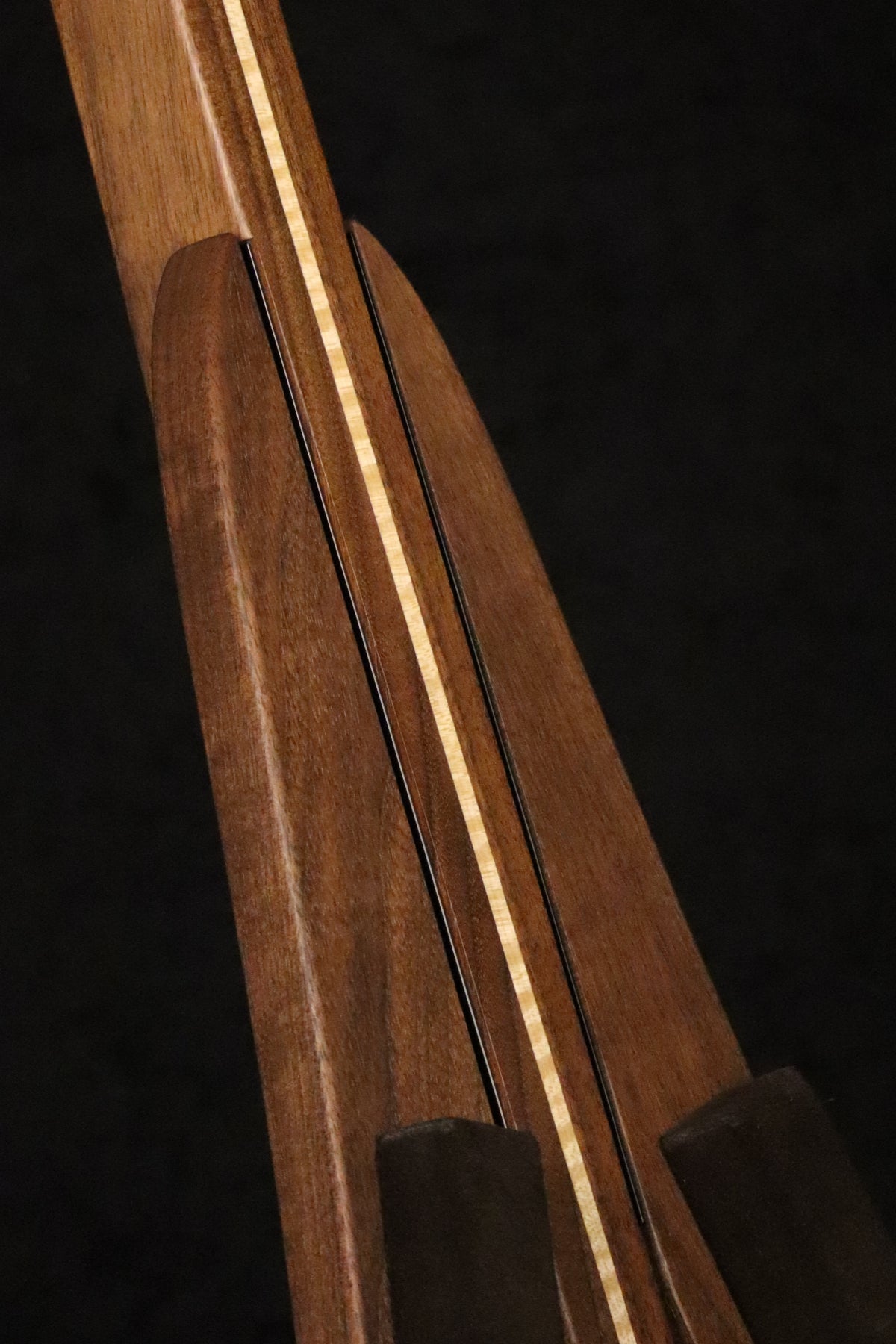 Folding walnut and curly maple wood ukulele floor stand closeup front image