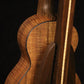 Folding walnut and curly maple wood ukulele floor stand closeup rear image with Martin ukulele